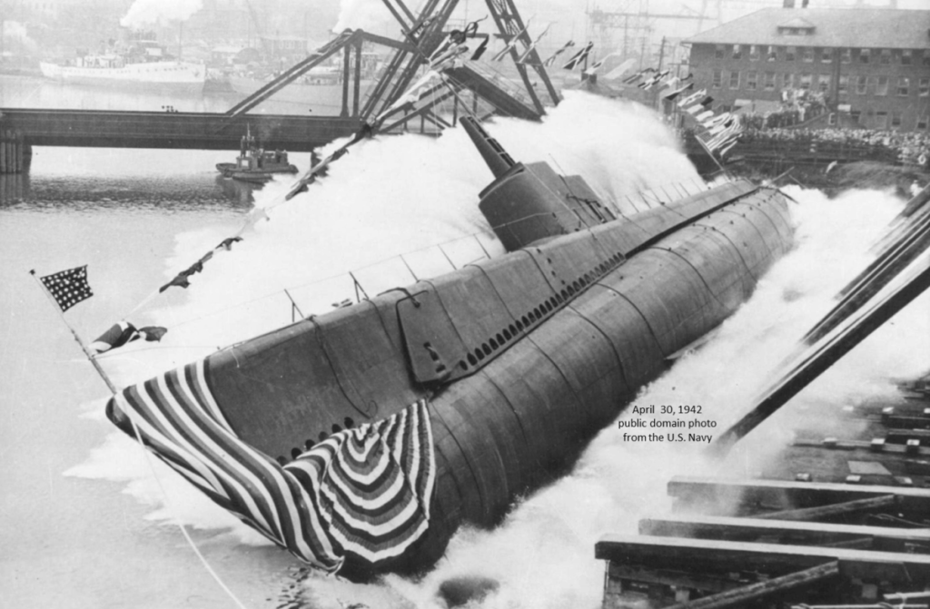 Manitowoc’s first submarine, USS Peto (SS-265) sideways launch into the Manitowoc River on April 30, 1942, Manitowoc, Wisconsin.